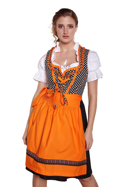 Traditionelles Dirndl mit Bluse und Schürze im klassischen Stil