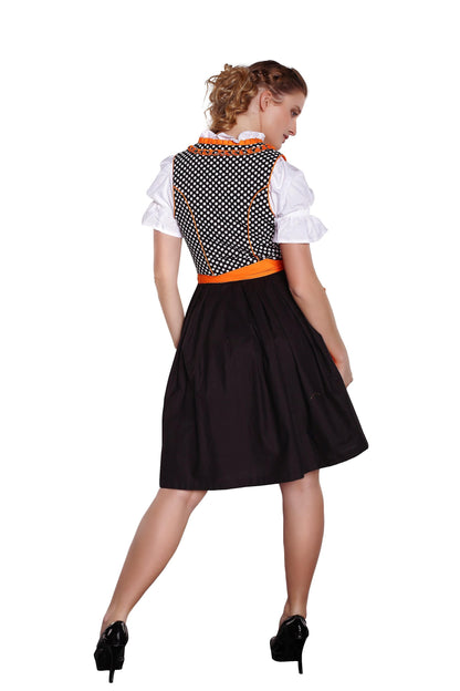 Traditionelles Dirndl mit Bluse und Schürze im klassischen Stil