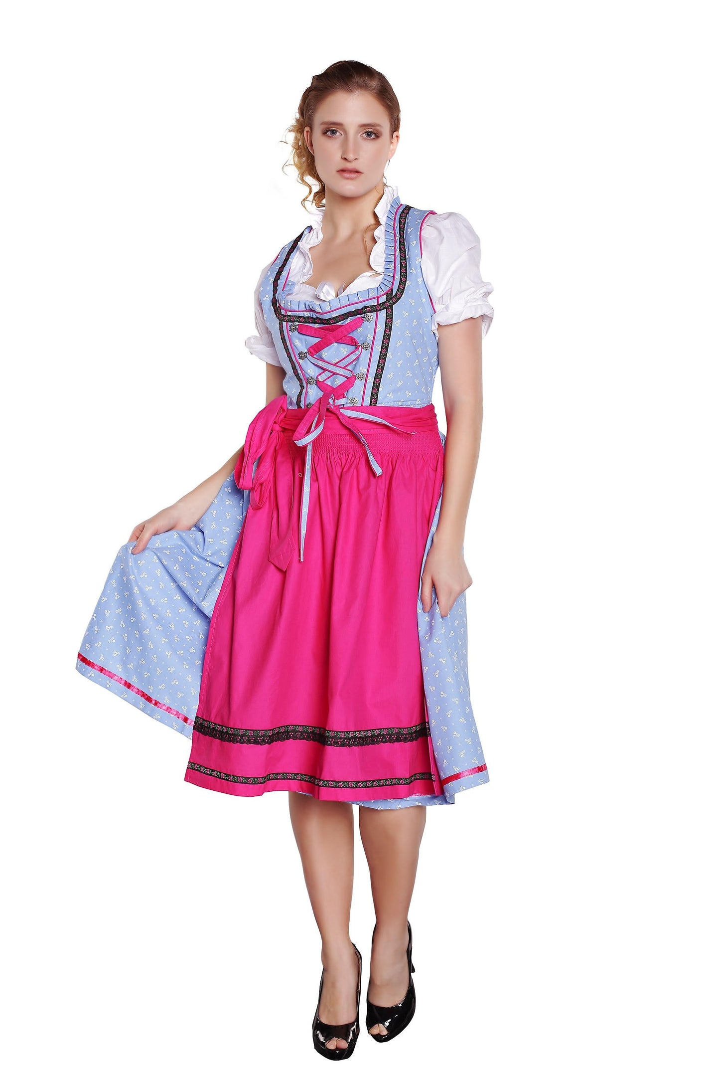 Traditionelles Dirndl mit Bluse und Schürze im klassischen Stil